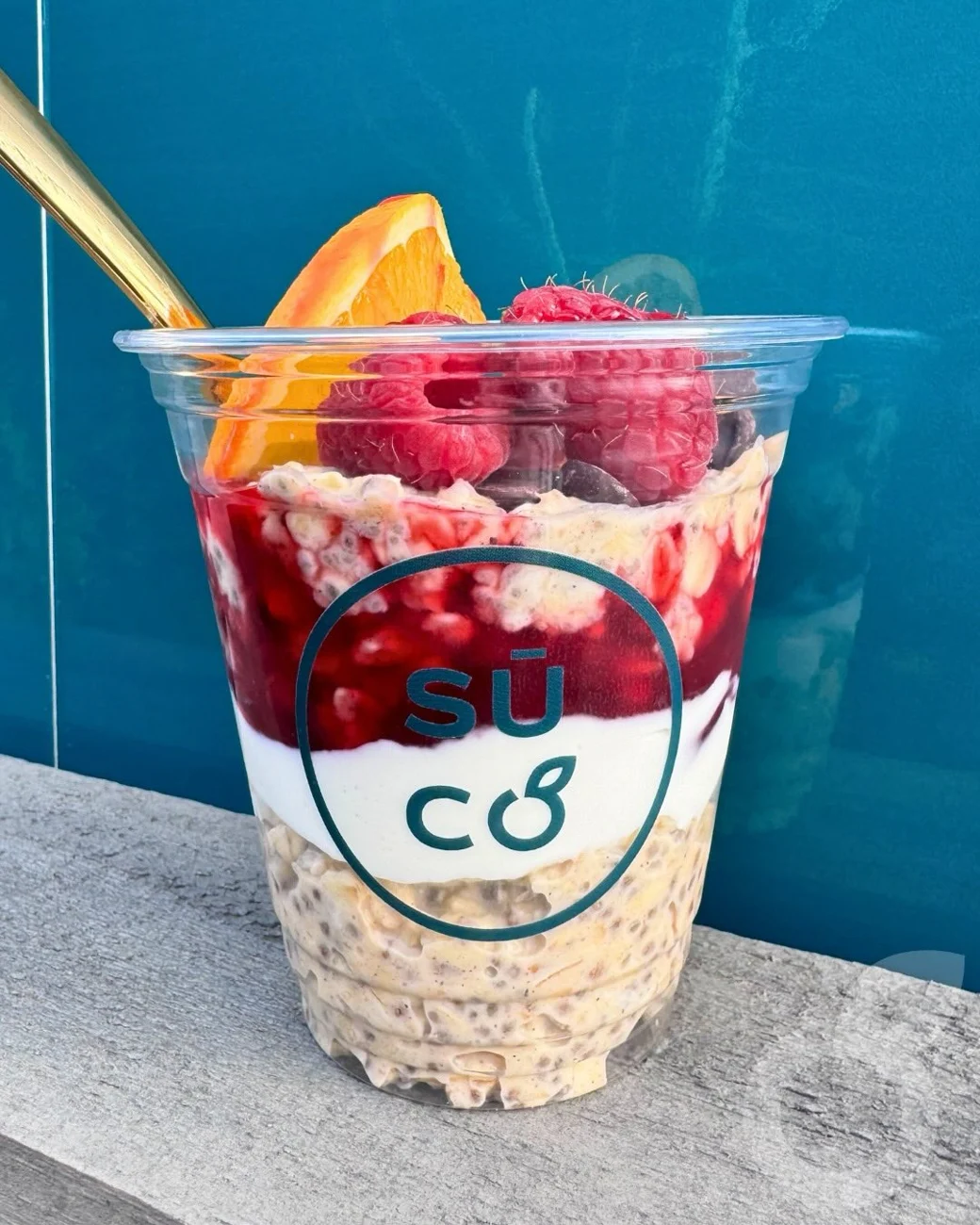 Raspberry Orange Overnight Oats photographed at Sūco Café Express